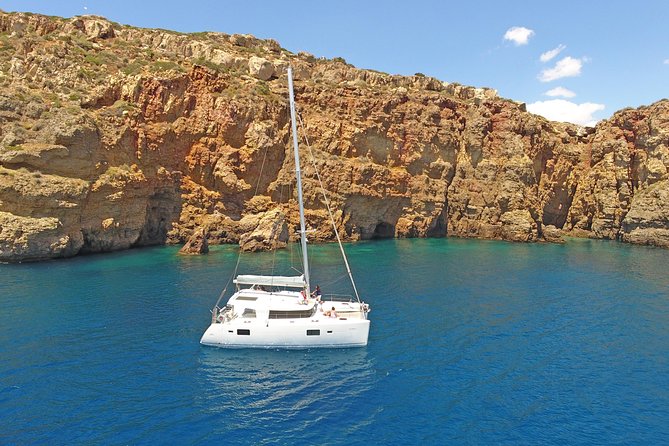 Luxury Catamaran Cruise from Athens with Traditional Greek Meal and BBQ - Sailing past Voula and Vouliagmeni