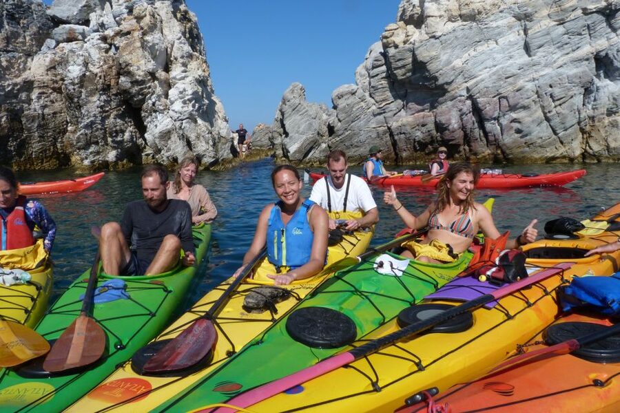 Milos: Guided Kayaking Trip with Snorkelling & Lunch - Paddling through caves and rock gardens