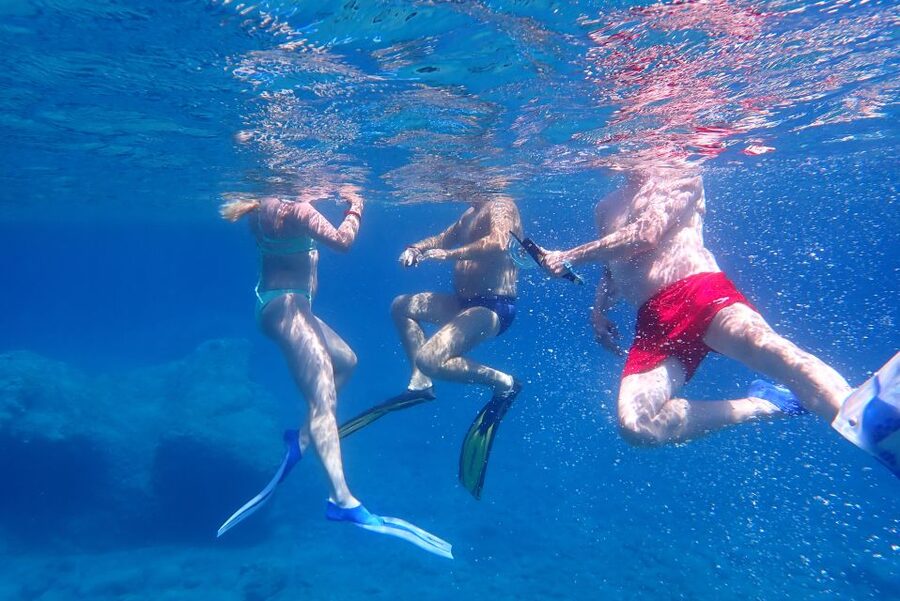 Milos: Guided Kayaking Trip with Snorkelling & Lunch - The afternoon return to the starting beach