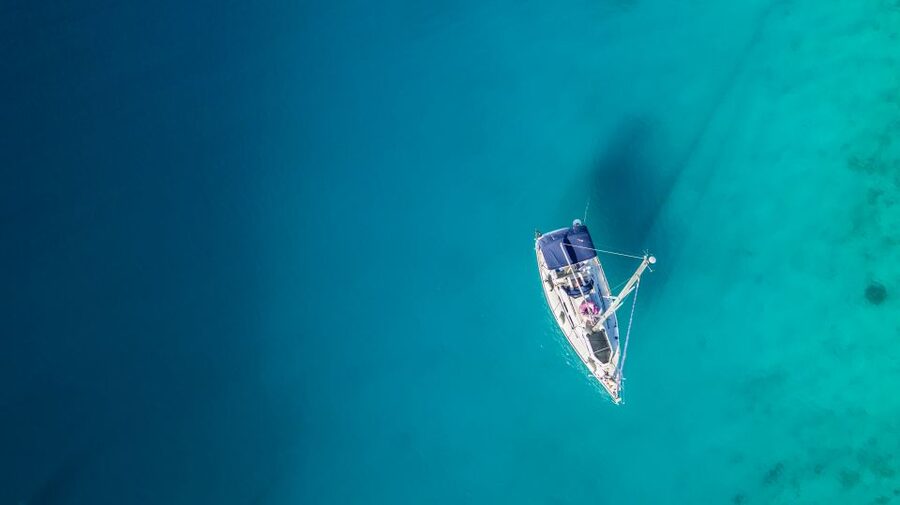 Mykonos: Delos and Rhenia Full-Day Sailing Cruise with Meal - Rhenia: Clear Water and Quiet Bays