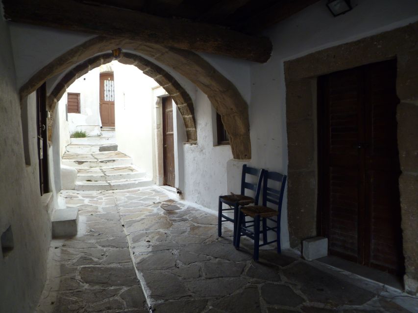 Naxos Castle Walking Tour and Sunset at the Portara - Walking down toward the Portara