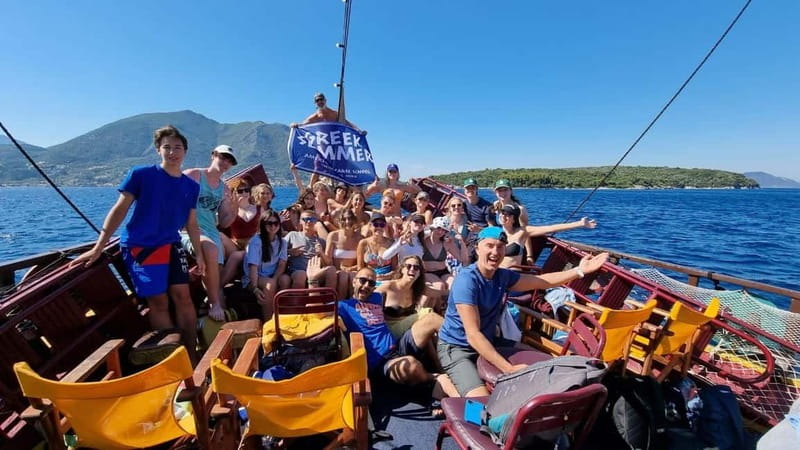 Nydri: Full-Day Wooden Boat Cruise with BBQ & Drinks - Papanikolis Cave and the First Swim