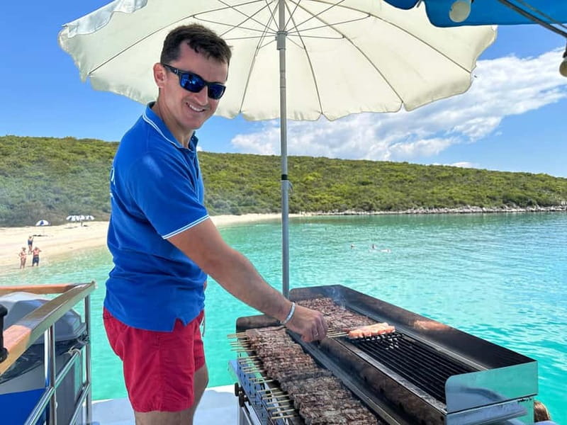 Nydri: Island Hopping Boat Cruise with Beach BBQ Lunch - Gerakas Beach and the beachside BBQ