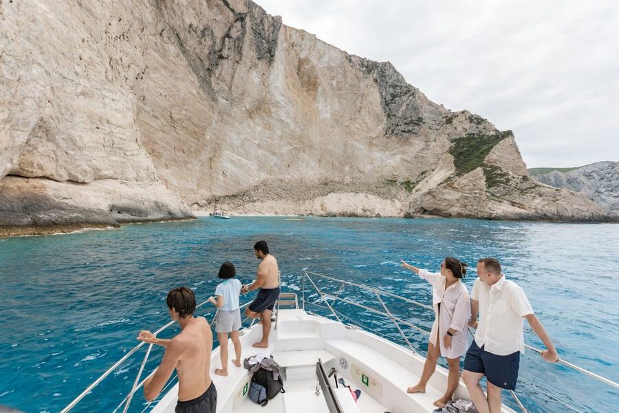 Porto Vromi: Navagio Shipwreck Beach & Blue Caves by Boat - Boat size, atmosphere, and crew style