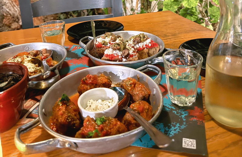 Rethymno Old Town: A Traditional Cretan Food Tour - Stop two: a local bakery and Cretan baking