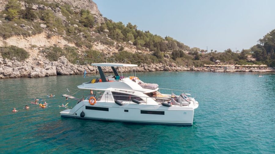 Rhodes: All-Inclusive Catamaran Cruise with Lunch and Drinks - Leaving Mandraki Harbor and settling into the morning