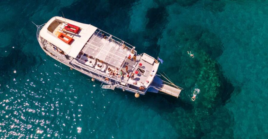 Rhodes: Bay to Bay Swim Cruise with Greek Buffet and Wine - Who should book the Romantika Dreams?