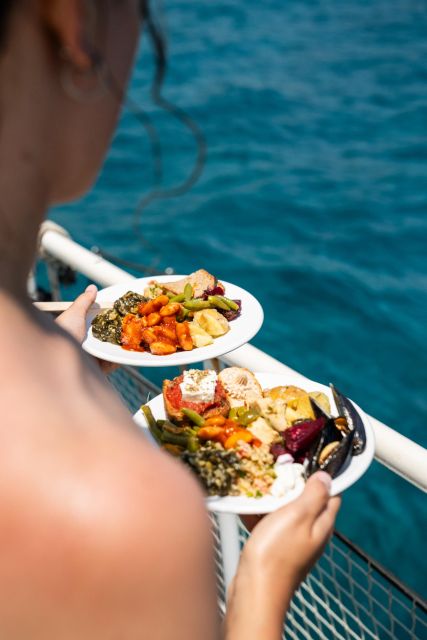 Rhodes: Bay to Bay Swim Cruise with Greek Buffet and Wine - Afandou Beach and the Traganou Caves