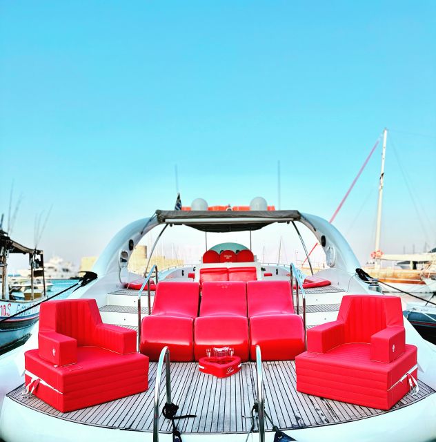 Rhodes: Beach Cruise with Swimming, Meal, & Unlimited Drinks - Finding the Opera Boat at Mandraki Marina