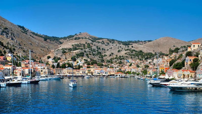 Rhodes: Boat trip to Symi island with swimming at St. George - Starting from Mandraki Harbor or your hotel