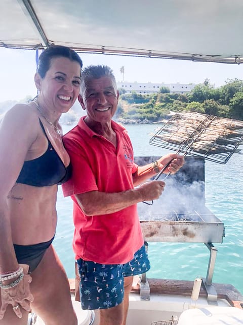 Rhodes: Captain Manolis Fishing Trip with BBQ and Swimming - A sea stop for swimming and snorkeling