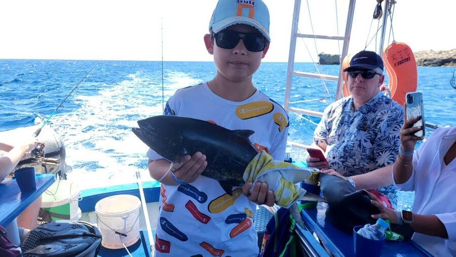 Rhodes: Fishing Trip, Snorkelling, BBQ, & Professional Guide - Lunch turns the catch into the main event
