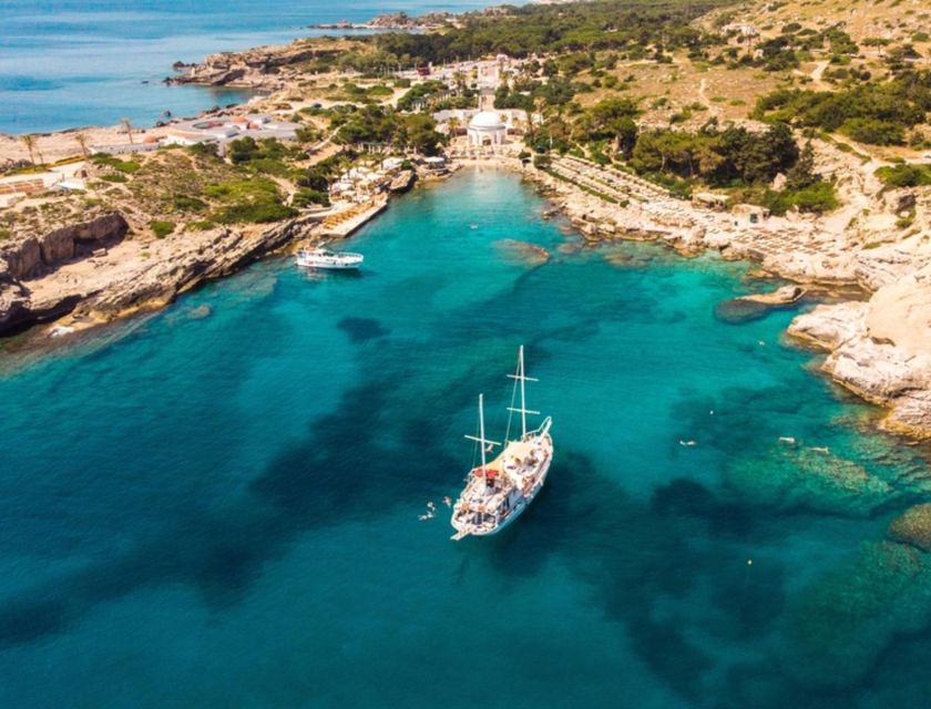 Rhodes: Sunset Cruise w/ Gourmet Buffet, Drinks & Live Music - Leaving Mandraki with Rhodes in view