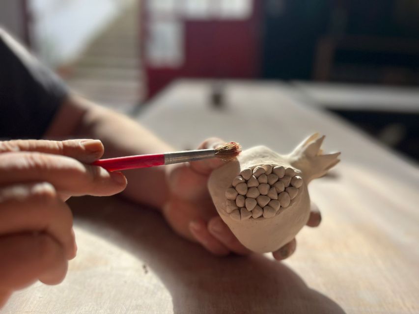 Rhodes Town: Pomegranate Pottery Masterclass - Entering the basement studio with red windows