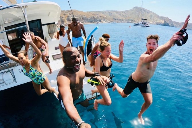 Santorini All-inclusive Catamaran Cruise with Thirassia Stop - Sunset from the Aegean