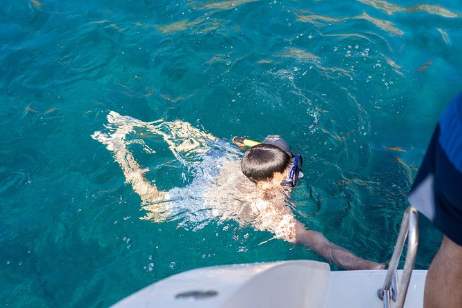 Santorini Caldera Gold Day Cruise with BBQ on board and Open Bar - Thirassia, lunch, and a slower part of the day
