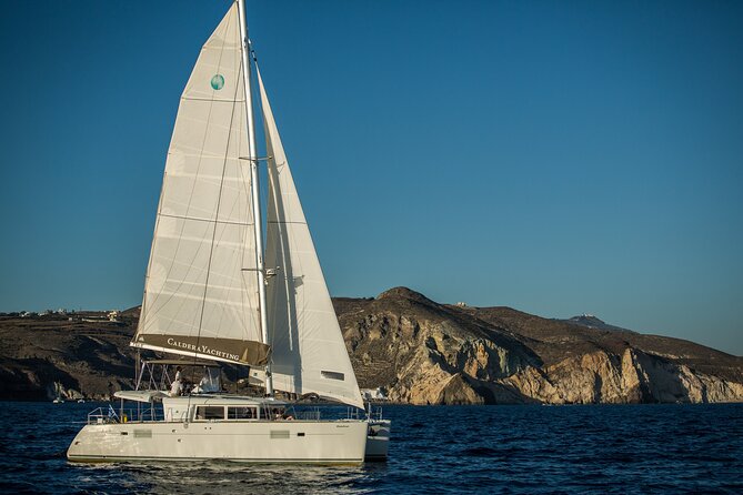 Santorini Caldera Gold Day Cruise with BBQ on board and Open Bar - The volcano and warm waters of Nea Kameni