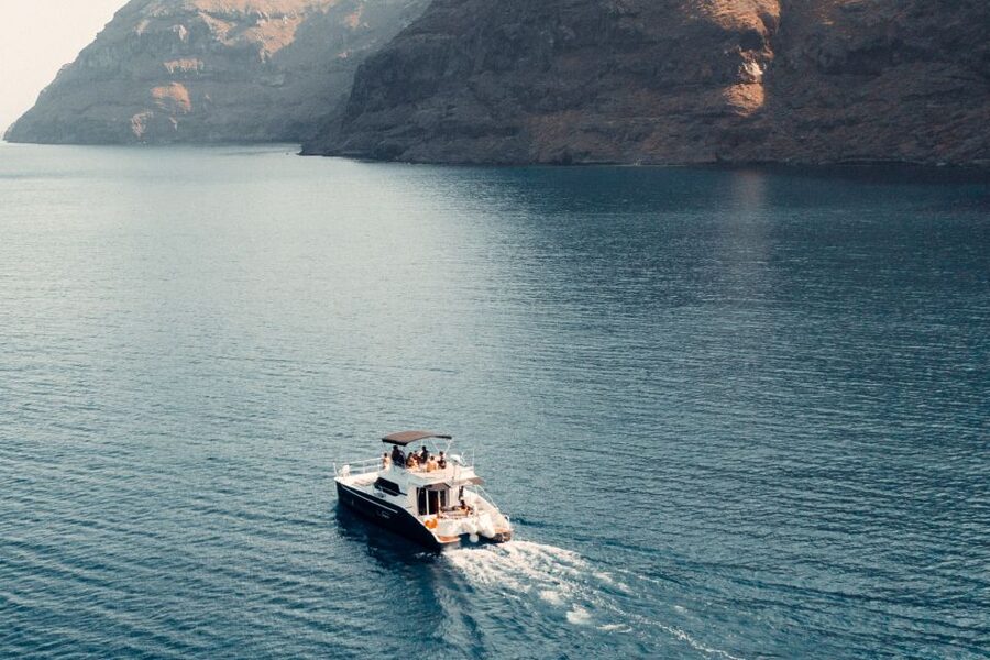 Santorini: Caldera Private Power Catamaran Cruise - Leaving Santorini from Ammoudi Bay