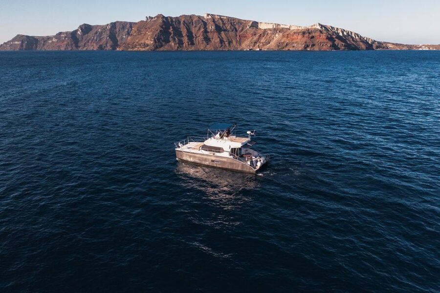 Santorini: Caldera Private Power Catamaran Cruise - Day cruise or sunset cruise?