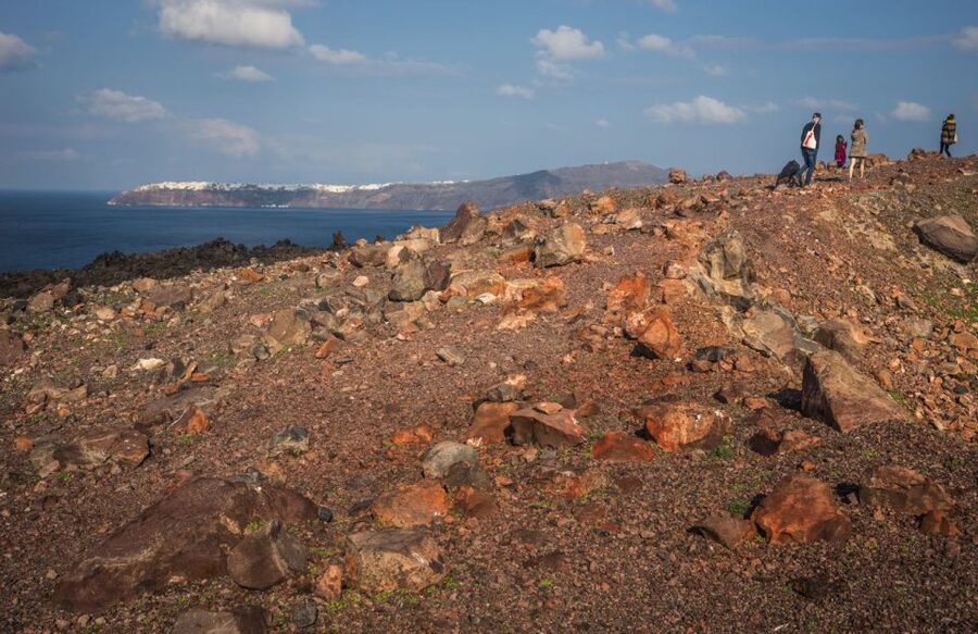 Santorini Caldera: Sunset Cruise with Dinner - Walking across volcanic Nea Kameni