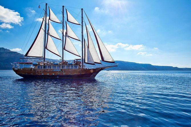 Santorini Caldera Sunset Sailing Cruise with Dinner and Wine - Pickup and boarding require attention