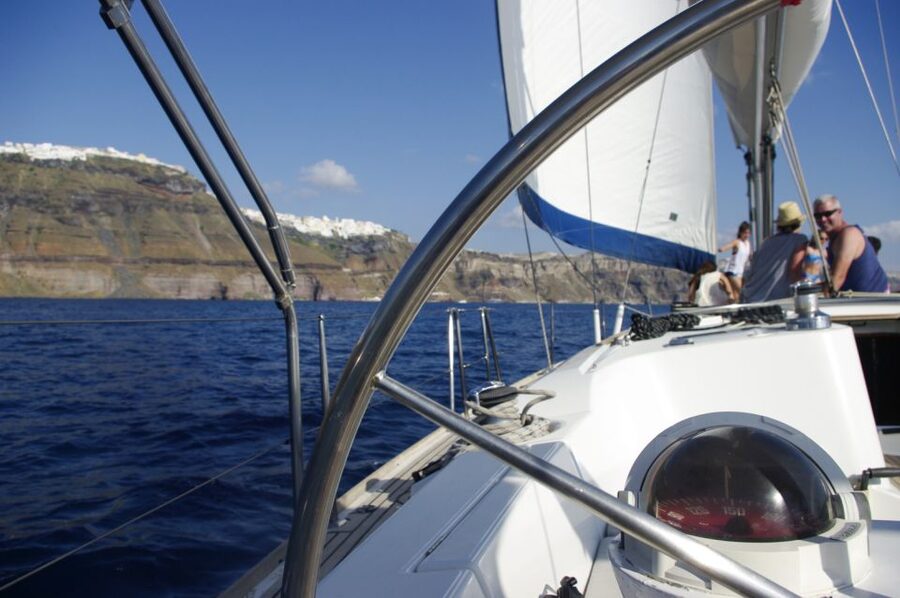 Santorini Caldera: Sunset Sailing Cruise with Meal - Red Beach, White Beach, and the southern coast