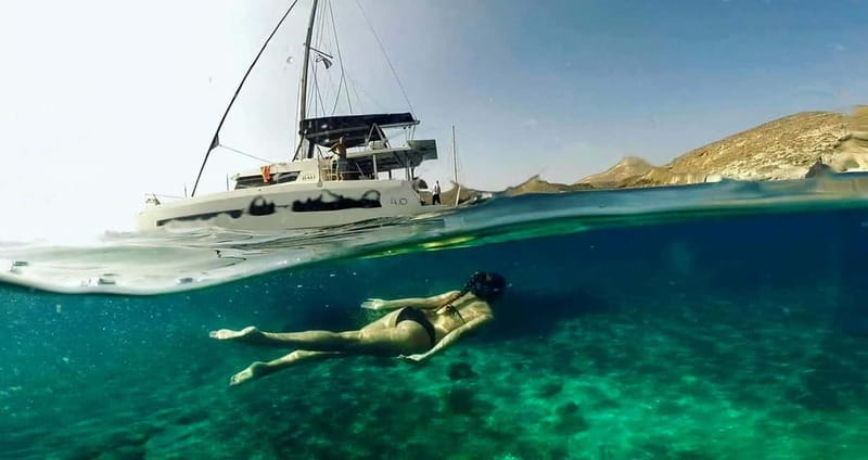 Santorini: Catamaran Cruise with Fresh Meal & Open Bar - Swimming near Black Mountain and the Akrotiri Lighthouse