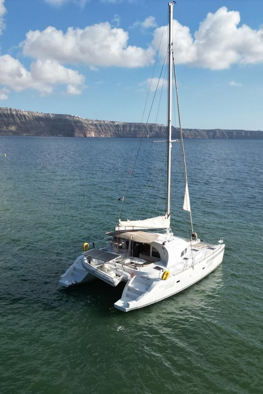 Santorini: Catamaran Cruise with Greek BBQ and Drinks - Indian Rocks and Akrotiri Lighthouse