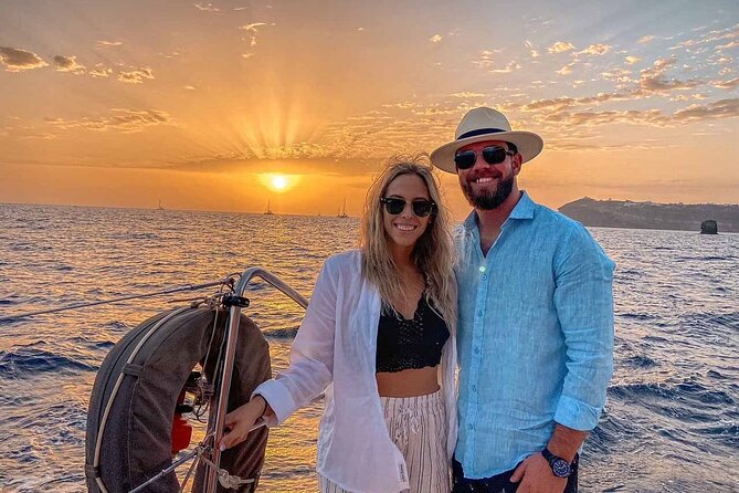 Santorini Catamaran Cruise with Greek Meal, Open-Bar and Sunset - The longer luxury route beneath Oia