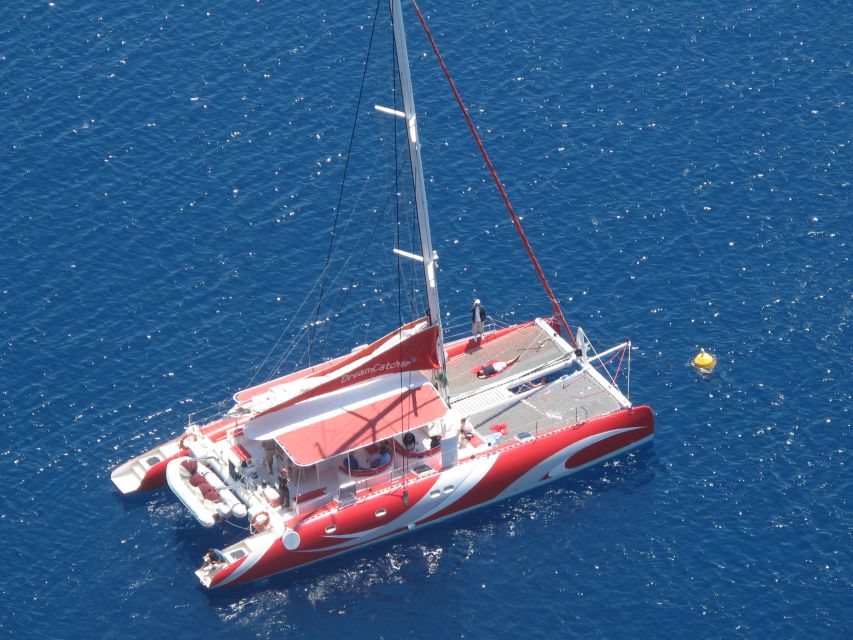 Santorini: Dream Catcher 5-hour Sailing Trip in the Caldera - Entering the Caldera past Indian Head Mountain
