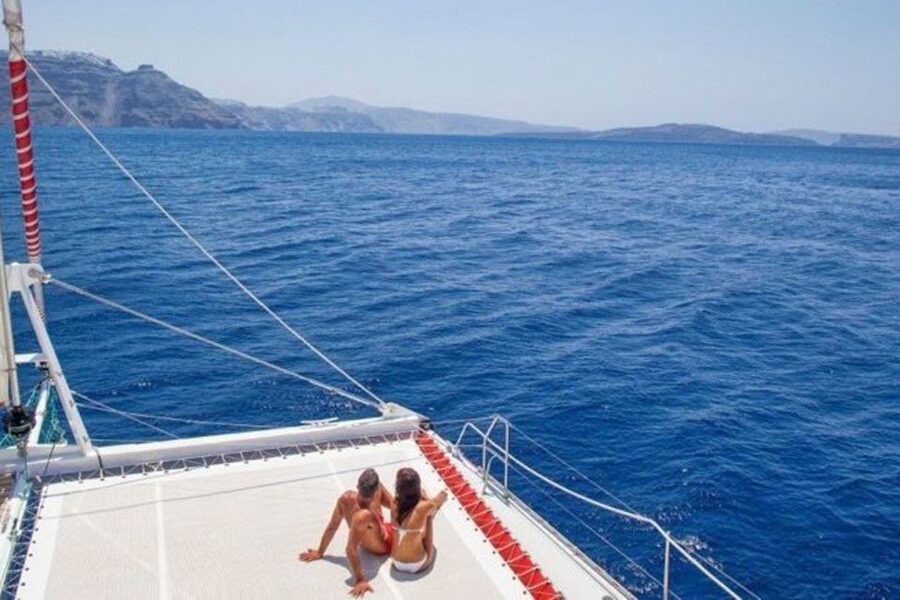 Santorini: Dream Catcher 5-hour Sailing Trip in the Caldera - Swimming in private bays