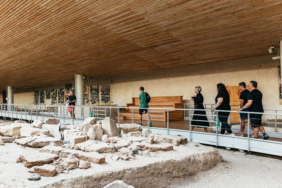 Santorini: Experience Akrotiri with a Licensed Tour Guide - Seeing kitchens, toilets, and ancient drainage