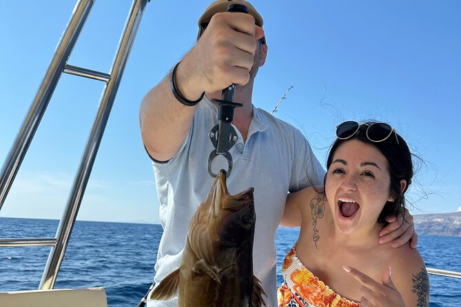 Santorini Fishing Private Cruise boat tour - BBQ, Snorkeling - Island stories from the water