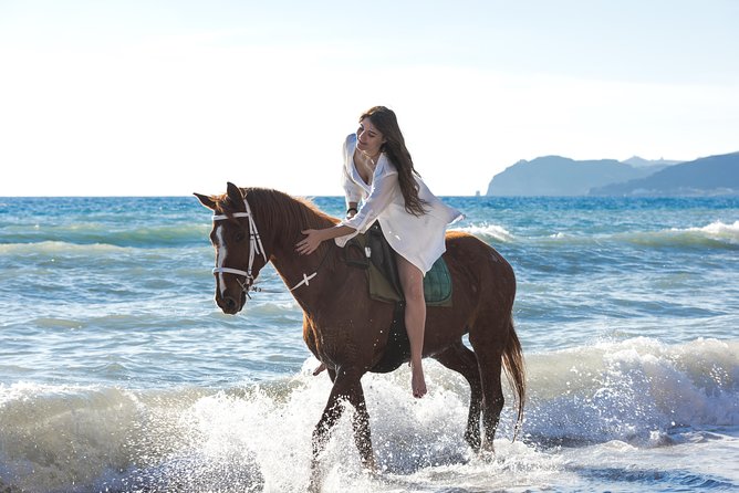 Santorini Horse Riding to Black Sandy Beach - Starting at the Efippos stable near Vlychada