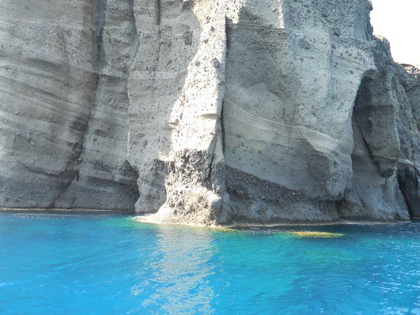 Santorini Luxury Catamaran Sunset Cruise with BBQ, Drink and Transfer - White Beach, barbecue, and the longest stop