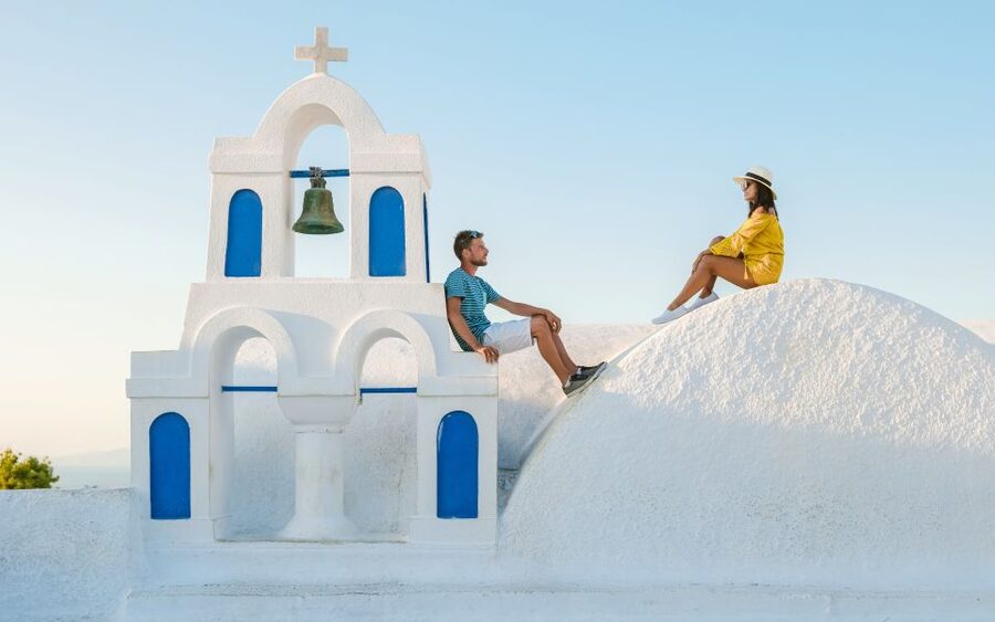 Santorini: Oia Village Professional Photo Shoot - Blue domes, white walls, and crowded viewpoints