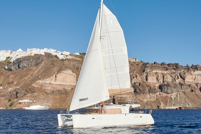 Santorini Platinum Catamaran Cruise with Meal, BBQ and Open Bar - Red Beach sets the tone