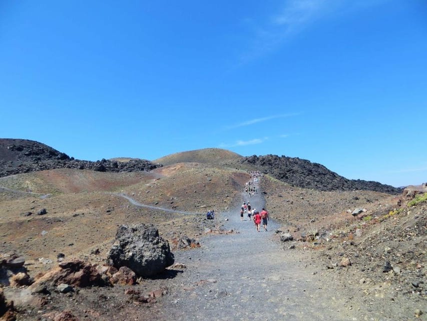 Santorini Port: Cruise to Volcano, Hot Springs & Thirassia - The long return past Oia and the caldera cliffs
