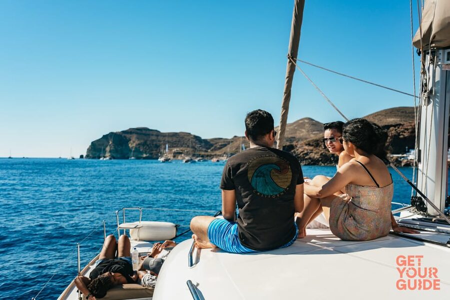 Santorini: Private Catamaran Tour with BBQ Meal and Drinks - Pickup, packing, and the cruise ship warning
