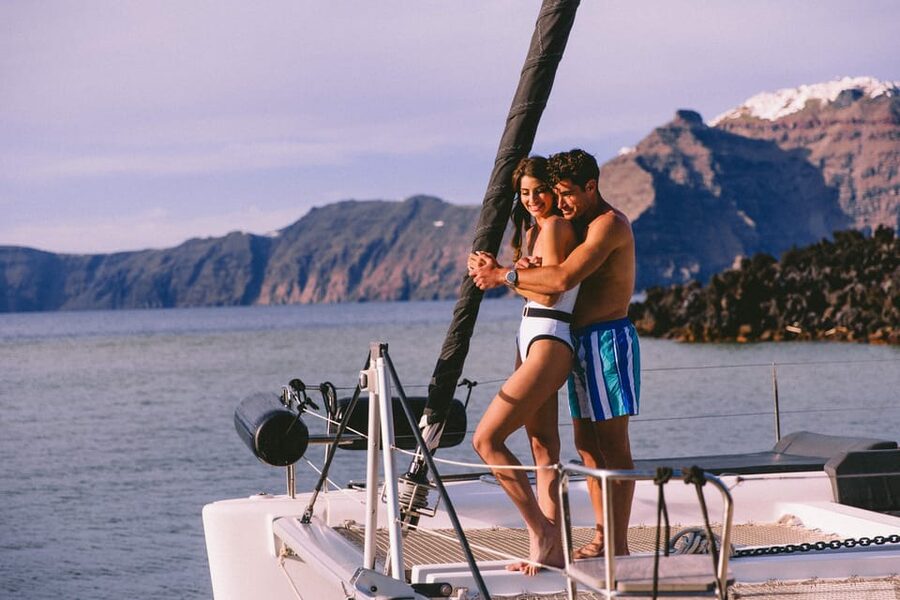 Santorini: Private Catamaran Tour with BBQ Meal and Drinks - Why seeing Santorini from the water changes the day