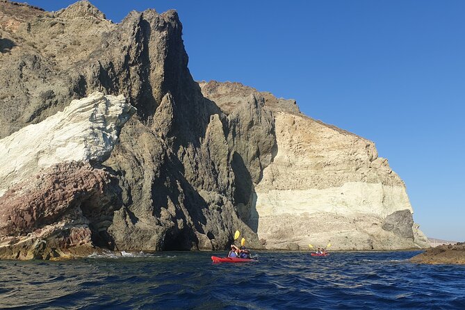Santorini Sea Kayak - South Discovery, Small Group incl. Sea Caves and picnic - Sunset timing and changing weather