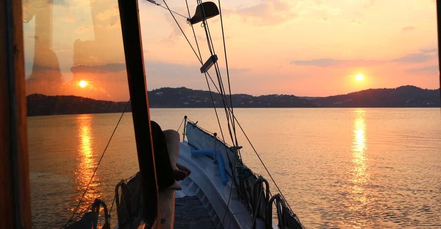 Skiathos: Boat Cruise with Dinner & Sunset Viewing - The Family Hosting Style