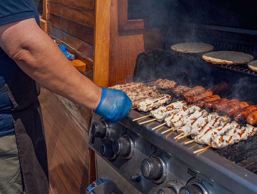 Skiathos: Wooden Sailboat Full- or Half-Day Trip with Meal - Food, music, and the social side of the day