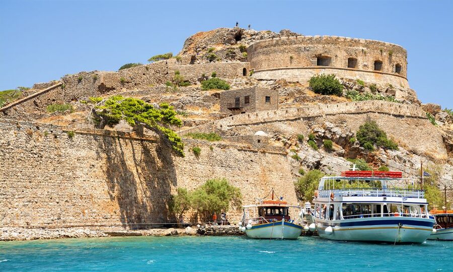 Spinalonga & Agios Nikolaos with BBQ - Elounda leads to the boat across Mirabello Bay
