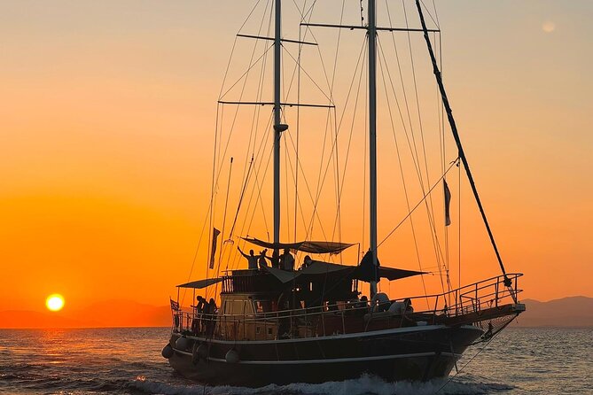 Sunset Dinner Cruise: Sunset, Swim, Drinks, and Dinner Onboard - Leaving Piraeus at 3 p.m.