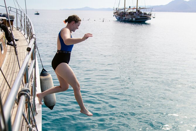 Sunset Dinner Cruise: Sunset, Swim, Drinks, and Dinner Onboard - Sunset views without giving up your Athens morning