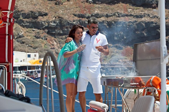 Sunset Sailing Catamaran Cruise in Santorini with BBQ and Drinks - Starting at Ammoudi or Athinios Port