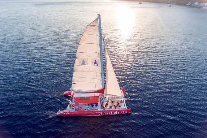 Sunset Sailing Catamaran Cruise in Santorini with BBQ and Drinks - Swimming at the hot springs