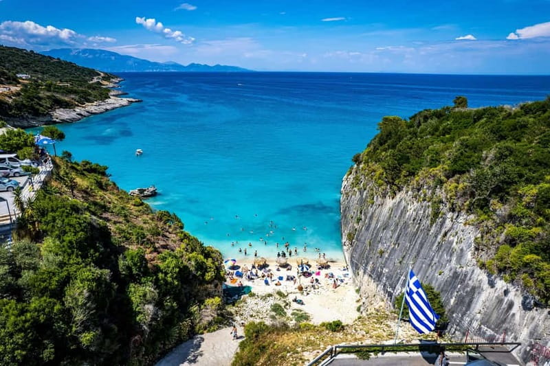 Zakinthos: Shipwreck Beach and Blue Caves Land and Sea Tour - Makris Gialos adds a bright coastal photo stop