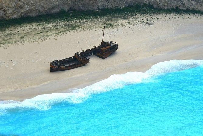 Zakynthos : One day small group tour to Navagio beach Blue Caves & top view - The Blue Caves and possible swimming